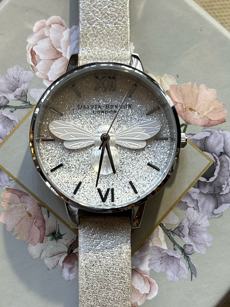Olivia Burton Watch With 34mm Silver Glittery Face With White 3d Perl Bee.
